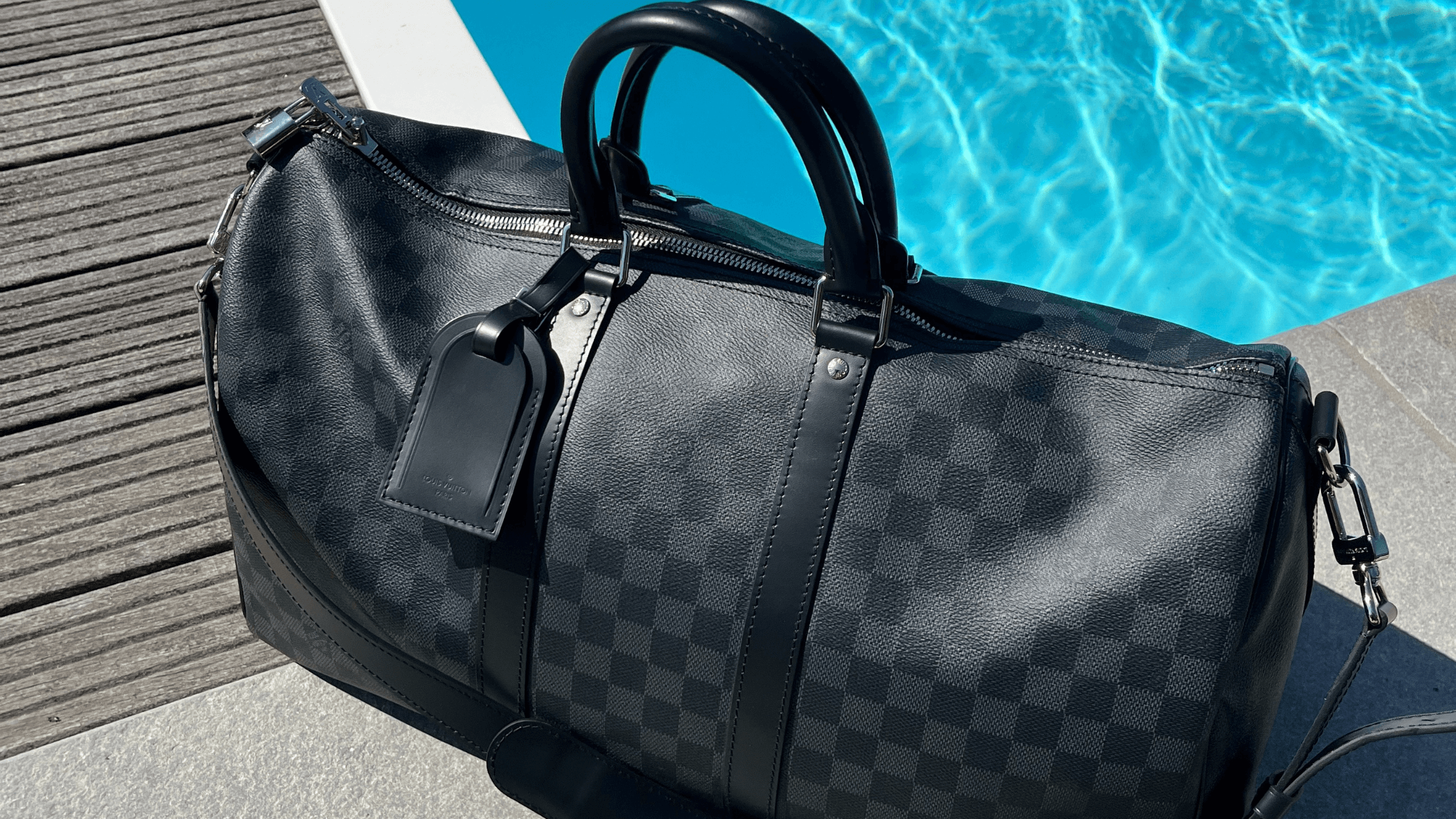 Louis Vuitton Damier Travel Bag by pool