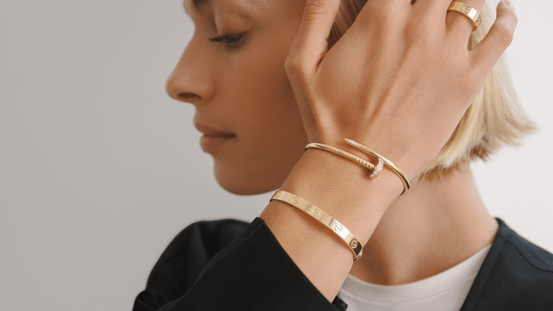 Cartier Love and Juste Un Clou bracelets on model