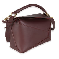 Dark Burgundy Soft Grained Calfskin Small Puzzle Edge Bag