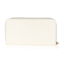 Cream Monogram Empreinte Zippy Wallet