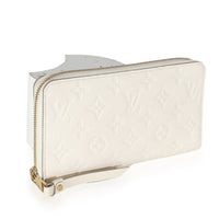 Cream Monogram Empreinte Zippy Wallet