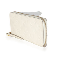 Cream Monogram Empreinte Zippy Wallet