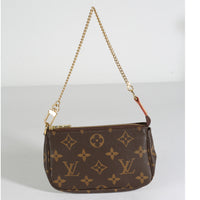 Monogram Canvas Mini Pochette Accessoires