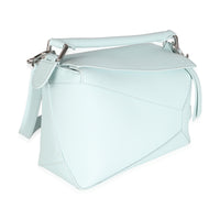 Light Blue Grained Calfskin Small Puzzle Edge Bag