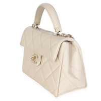 Beige Quilted Caviar Mini Retro Twist Top Handle Flap Handbag