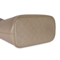 Tourterelle Giant Monogram Empreinte Neverfull MM