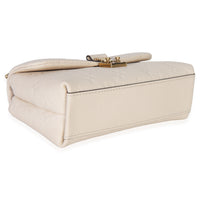 Louis Vuitton Cream Monogram Empreinte Nano Madeleine Handbag clasp