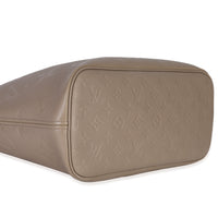 Louis Vuitton Turtledove Giant Monogram Empreinte Neverfull MM Handbag clasp