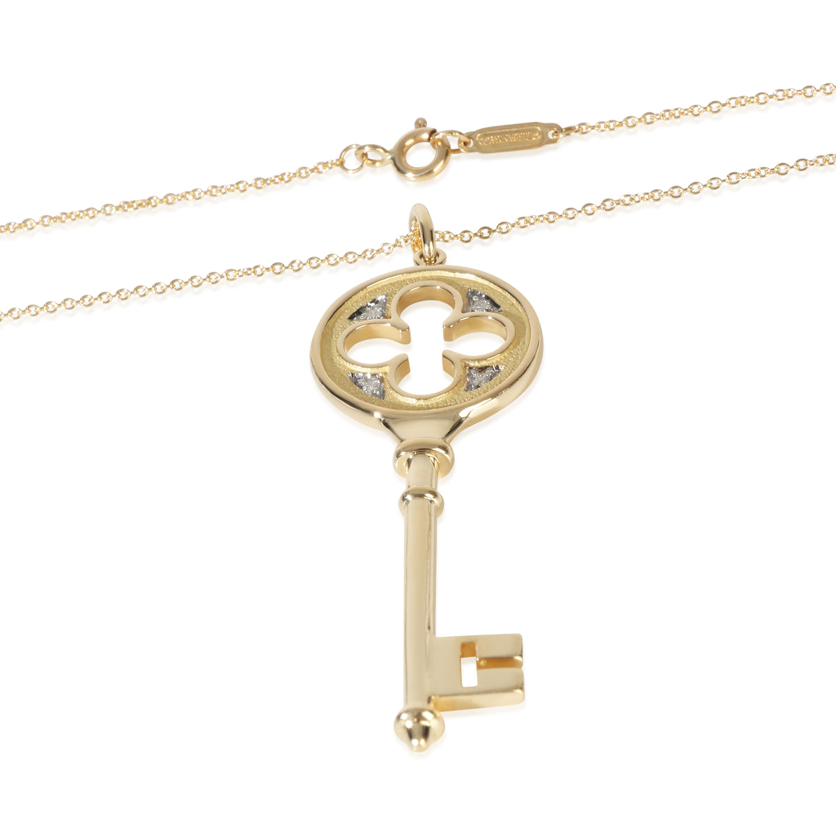 Tiffany & Co. Yellow Gold Diamond Quatrefoil Key Pendant sv