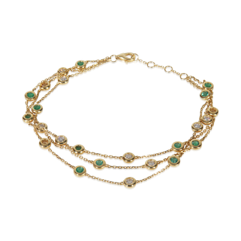 Yellow Gold Emerald and Diamond Triple Strand Station Bracelet