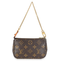 Monogram Canvas Trunks Mini Pochette Accessoires