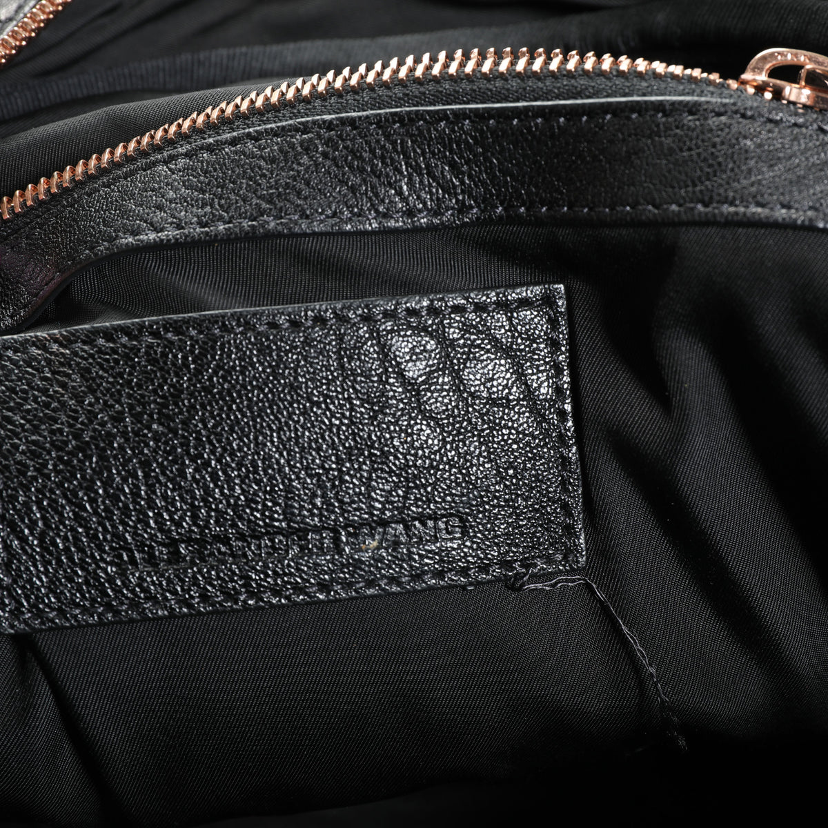 Alexander Wang Black Pebbled Leather Rose Gold-Studded Dumbo Backpack | myGemma Alexander Wang Black Pebbled Leather Rose Gold-Studded Dumbo Backpack | myGemma