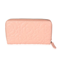 Chanel Peach Pink Camellia Embossed Zip Around Wallet