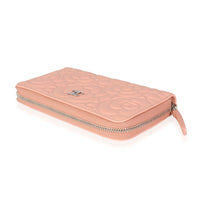 Chanel Peach Pink Camellia Embossed Zip Around Wallet