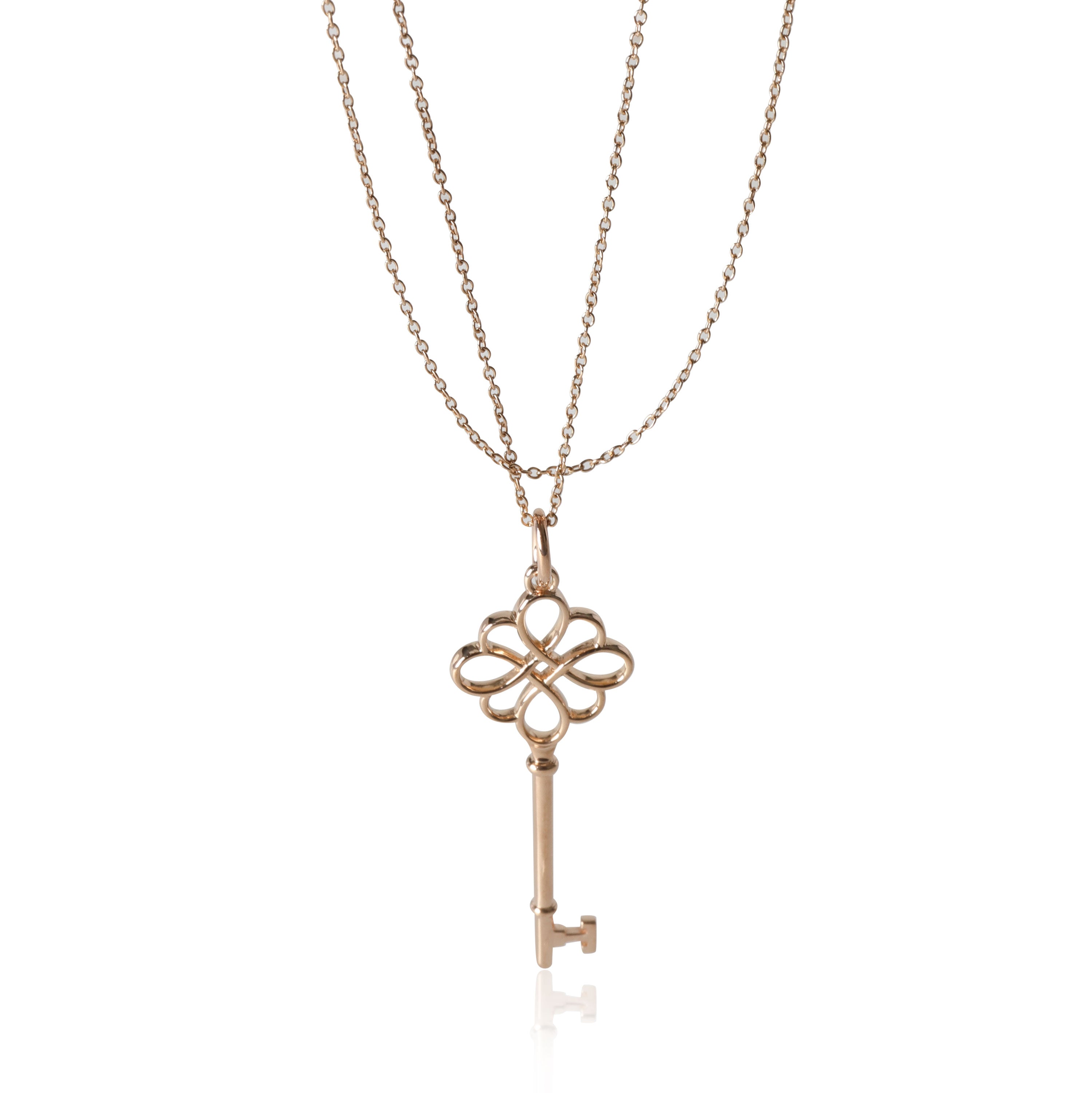 Tiffany Keys knot key pendant in 18k white gold with diamonds on a