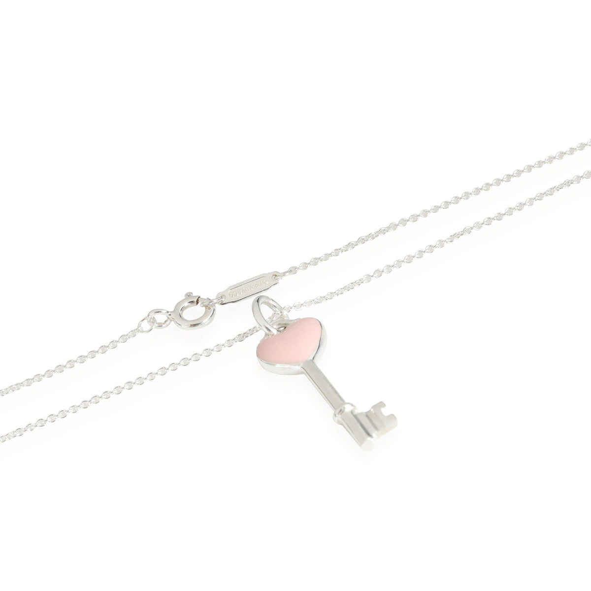 Elsa Peretti® Open Heart pendant in sterling silver with a pink sapphire. |  Tiffany & Co.