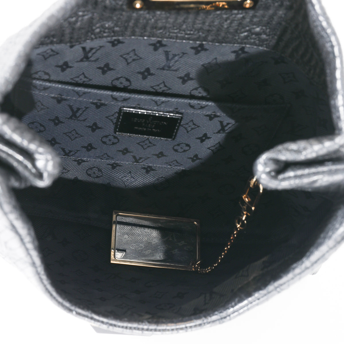 Louis Vuitton Limelight Pochette Altair Bag