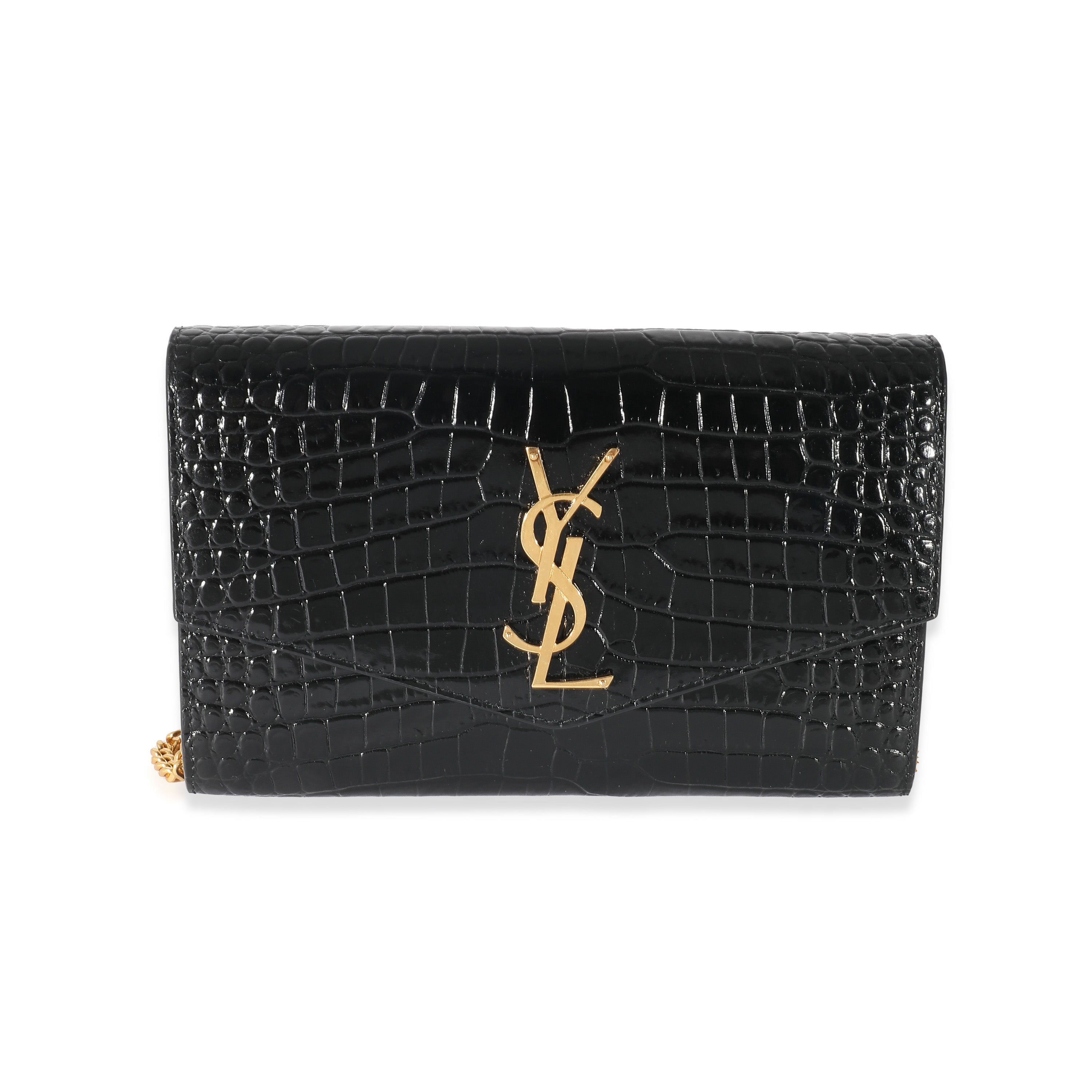 — YSL's envelope chain wallet gives casual