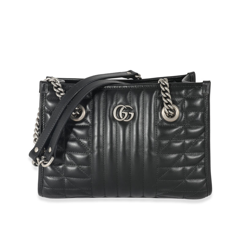 First developed by Gucci in the 1950s, the House Web stripe runs down the  center of a medium shoulder bag in GG Supre…