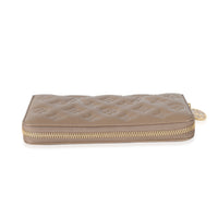 Louis Vuitton Taupe Monogram Embossed Lambskin Coussin Zippy Wallet