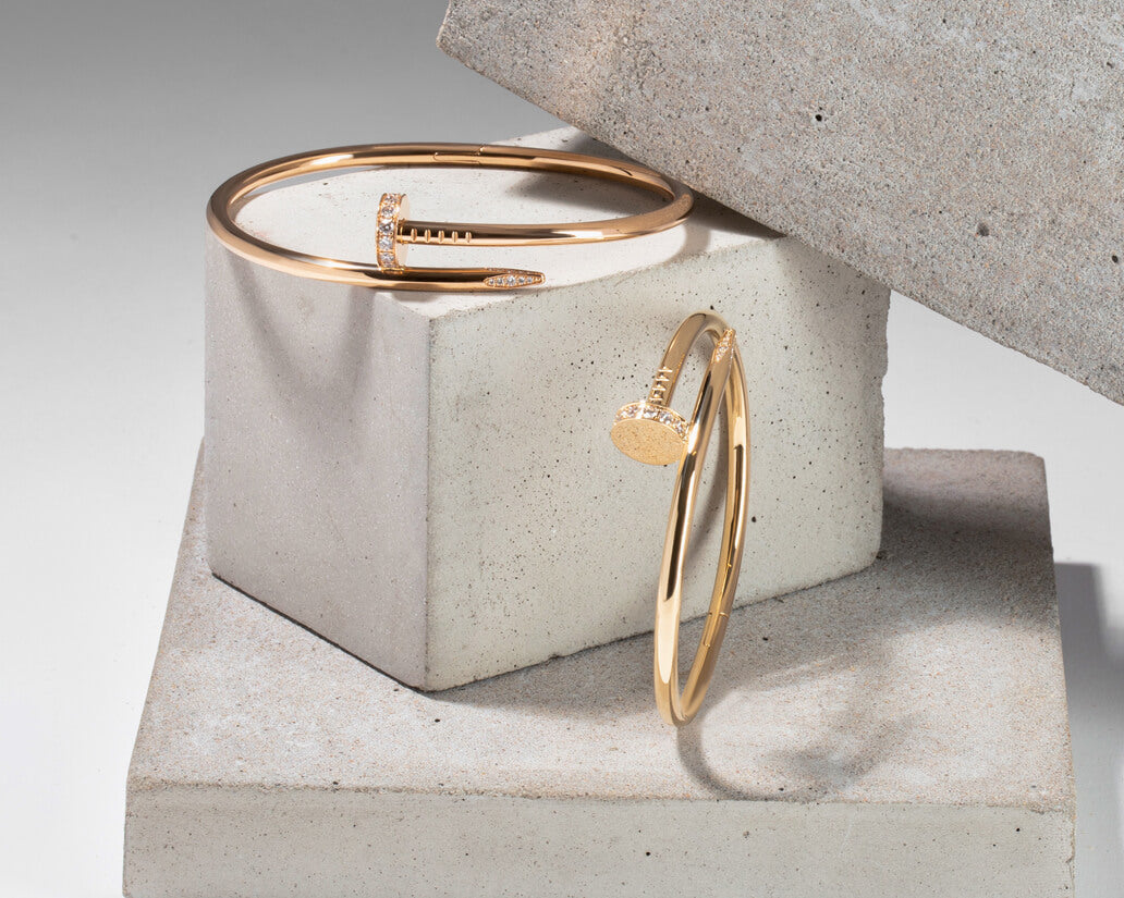 Two Cartier Juste un Clou bracelets in yellow gold